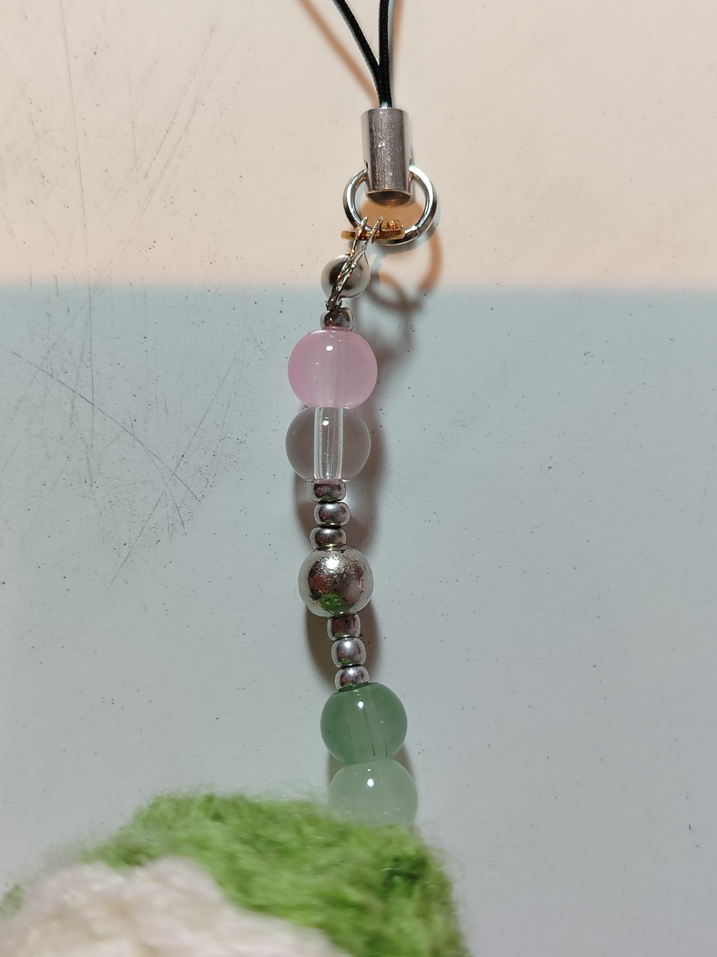 Crochet snail phone charm